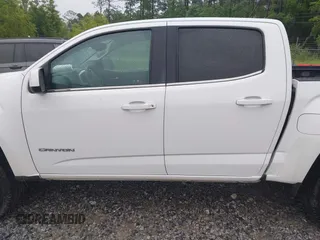 2018 GMC Canyon z VIN 1GTG5CE14J1134654, wystawiony jako IAAI lot #42203541 z przebiegiem 147 881 mil mil oraz . Historia ofert i sprzedaży dostępna na DreamBid. Obrazek 14.