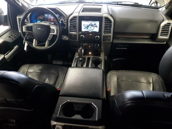 2015 Ford F-150 XLT w/HD Payload Pkg with VIN 1FTFW1EG8FFC65095, listed as a Copart auction lot 52502095 with 180,531 mi miles and Clean Title. Bid and sale history available at carsss.com. Image 8.