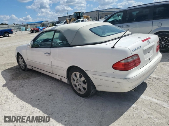 2003 Mercedes-Benz CLK-Class 3.2L with VIN WDBLK65G73T135929, listed as a Copart auction lot 76175704 with 114,677 mi miles and Salvage Title. Bid and sale history available at carsss.com. Image 2.