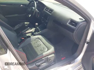 2014 Volkswagen Jetta GLI Autobahn with VIN 3VW5T7AJXEM310901, listed as a IAAI auction lot 42622301 with 139,821 mi miles and . Bid and sale history available at DreamBid. Image 5.