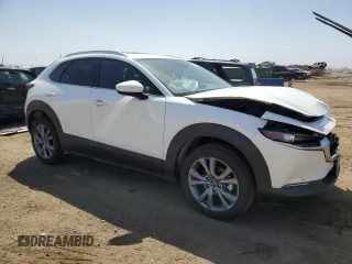 2024 Mazda CX-30 S Preferred with VIN 3MVDMBCM9RM715920, listed as a Copart auction lot 52380315 with 4,461 mi miles and Salvage Title. Bid and sale history available at DreamBid. Image 4.