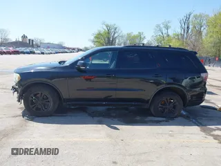2011 Dodge Durango Crew with VIN 1D4RD4GG2BC694846, listed as a IAAI auction lot 41962959 with 206,050 mi miles and . Bid and sale history available at DreamBid. Image 14.