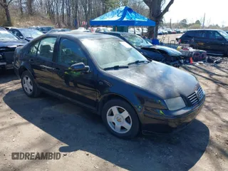 2000 Volkswagen Jetta z VIN 3VWSC29M9YM005902, wystawiony jako IAAI lot #41996604 z przebiegiem 72 699 mil mil oraz . Historia ofert i sprzedaży dostępna na DreamBid. Obrazek 1.