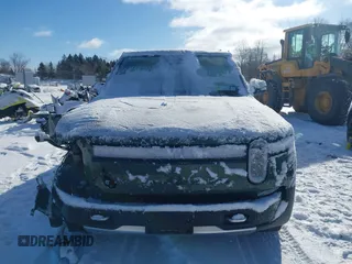 2024 Rivian R1S Adventure with VIN 7PDSGBBA9RN042780, listed as a IAAI auction lot 41440424 with 10,747 mi miles. Bid and sale history available at carsss.com. Image 13.
