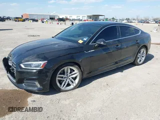 2019 Audi A5 Sportback Premium with VIN WAUANCF51KA061345, listed as a IAAI auction lot 41841741 with 84,732 mi miles. Bid and sale history available at carsss.com. Image 2.