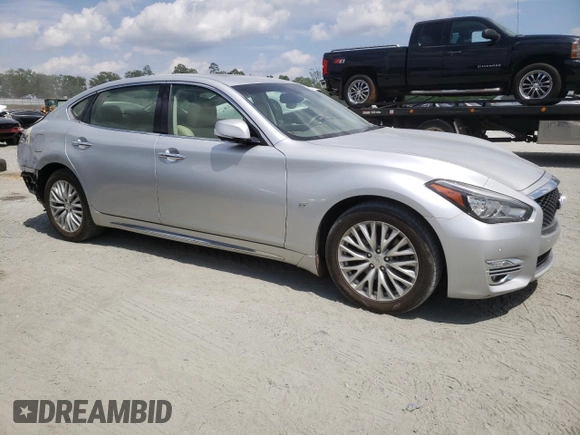 2016 Infiniti Q70 z VIN JN1BY1PP6GM631254, wystawiony jako Copart lot #56377425 z przebiegiem 109 061 mil mil oraz Szkoda całkowita • Salvage title. Historia ofert i sprzedaży dostępna na DreamBid. Obrazek 4.
