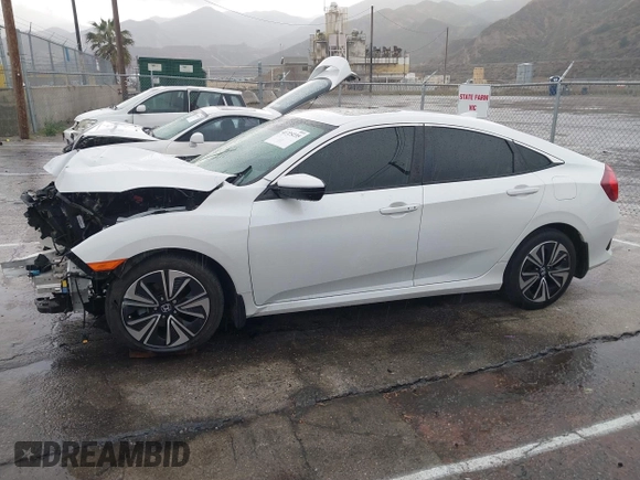 2020 Honda Civic EX-L with VIN 19XFC1F7XLE208720, listed as a IAAI auction lot 41725235 with 70,794 mi miles and . Bid and sale history available at DreamBid. Image 14.