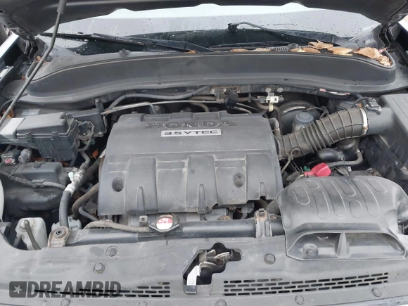 2012 Honda Ridgeline RT with VIN 5FPYK1F24CB456298, listed as a IAAI auction lot 40869948 with 123,329 mi miles and . Bid and sale history available at DreamBid. Image 10.