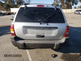 2003 Jeep Grand Cherokee Laredo with VIN 1J4GX48S63C523513, listed as a Copart auction lot 50001005 with 0 mi miles and Salvage Title. Bid and sale history available at carsss.com. Image 6.
