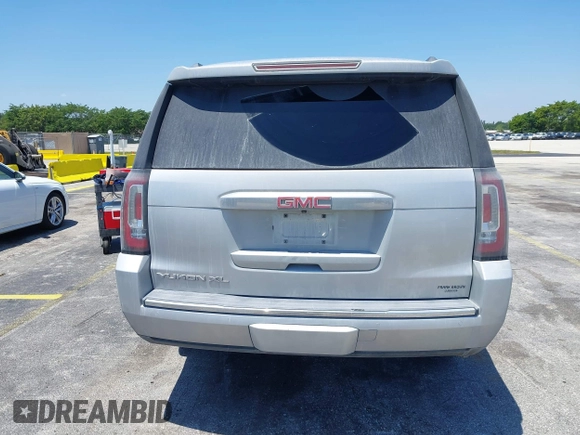 2016 GMC Yukon XL Denali with VIN 1GKS2HKJXGR423556, listed as a IAAI auction lot 42145970 with 118,436 mi miles. Bid and sale history available at carsss.com. Image 16.