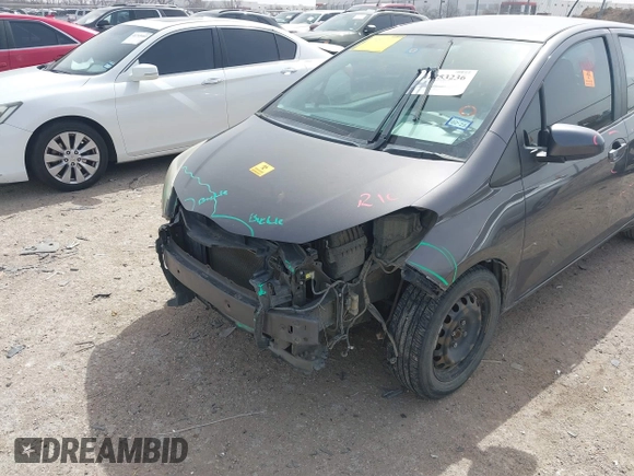 2015 Toyota Yaris L with VIN VNKKTUD32FA037394, listed as a IAAI auction lot 41753236 with Not Provided miles and . Bid and sale history available at DreamBid. Image 6.