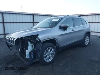 2014 Jeep Cherokee Latitude with VIN 1C4PJMCSXEW220556, listed as a IAAI auction lot 41060501 with 70,152 mi miles and . Bid and sale history available at carsss.com. Image 17.