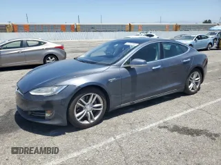 2014 Tesla Model S 60 с VIN 5YJSA1H11EFP57491, выставлен на аукционе Copart как лот 61332585 с пробегом 123 697 миль миль и Списание • Salvage title. История ставок и продаж доступна на DreamBid. Изображение 1.