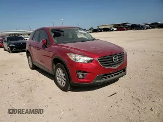 2016 Mazda CX-5 Touring with VIN JM3KE2CYXG0638247, listed as a Copart auction lot 53087305 with 0 mi miles and Salvage Title. Bid and sale history available at carsss.com. Image 11.