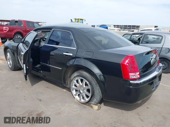 2008 Chrysler 300 C Hemi with VIN 2C3KA63H18H335466, listed as a IAAI auction lot 41899381 with Not Provided miles and . Bid and sale history available at carsss.com. Image 3.