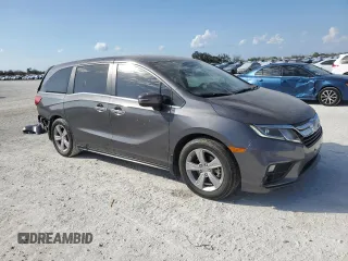 2019 Honda Odyssey EX with VIN 5FNRL6H50KB010498, listed as a Copart auction lot 45199565 with 82,964 mi miles and Salvage Title. Bid and sale history available at carsss.com. Image 4.