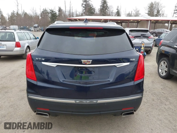2017 Cadillac XT5 FWD with VIN 1GYKNARS2HZ188557, listed as a IAAI auction lot 41840764 with 104,524 mi miles. Bid and sale history available at carsss.com. Image 16.