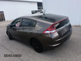 2012 Honda Insight LX with VIN JHMZE2H50CS004626, listed as a Copart auction lot 65198795 with 153,085 mi miles and Clean title. Bid and sale history available at DreamBid. Image 3.