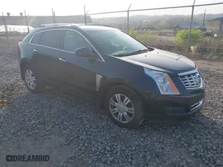 2014 Cadillac SRX Luxury Collection with VIN 3GYFNEE32ES610813, listed as a IAAI auction lot 42098401 with 112,000 mi miles. Bid and sale history available at carsss.com. Image 1.