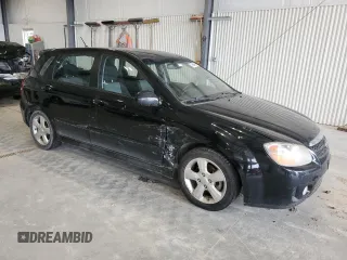 2007 Kia Spectra with VIN KNAFE161375009514, listed as a Copart auction lot 51656405 with 137,418 mi miles and Salvage Title. Bid and sale history available at carsss.com. Image 4.