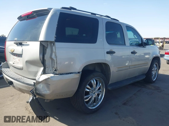 2007 Chevrolet Tahoe LS with VIN 1GNFC13C87R308432, listed as a IAAI auction lot 41740545 with 251,195 mi miles and . Bid and sale history available at DreamBid. Image 4.