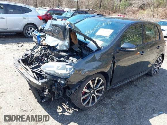 2012 Volkswagen GTI w/Sunroof & Navi PZEV z VIN WVWGD7AJXCW209878, wystawiony jako IAAI lot #41860048 z przebiegiem 154 266 mil mil oraz . Historia ofert i sprzedaży dostępna na DreamBid. Obrazek 2.