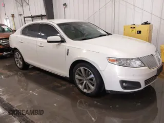2012 Lincoln MKS with VIN 1LNHL9ER2CG803230, listed as a IAAI auction lot 41734620 with 66,585 mi miles. Bid and sale history available at carsss.com. Image 1.