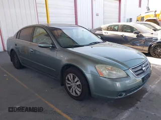 2004 Nissan Altima S with VIN 1N4AL11D14C104543, listed as a IAAI auction lot 42514956 with 164,610 mi miles and . Bid and sale history available at DreamBid. Image 1.