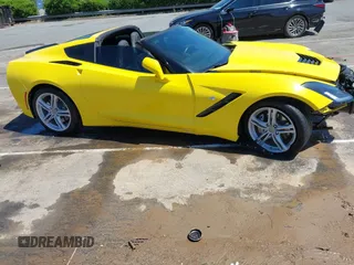 2016 Chevrolet Corvette 1LT z VIN 1G1YB2D77G5111974, wystawiony jako IAAI lot #42134341 z przebiegiem 28 287 mil mil oraz . Historia ofert i sprzedaży dostępna na DreamBid. Obrazek 20.