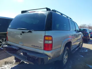 2003 Chevrolet Suburban Z71 with VIN 3GNFK16Z33G253479, listed as a IAAI auction lot 41871504 with 157,990 mi miles and . Bid and sale history available at DreamBid. Image 4.