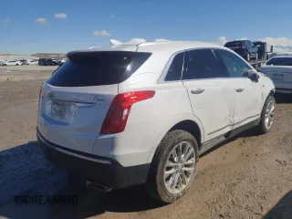 2019 Cadillac XT5 Premium Luxury AWD z VIN 1GYKNFRS5KZ252885, wystawiony jako Copart lot #49729865 z przebiegiem 54 593 mil mil oraz Szkoda całkowita • Salvage title. Historia ofert i sprzedaży dostępna na DreamBid. Obrazek 3.