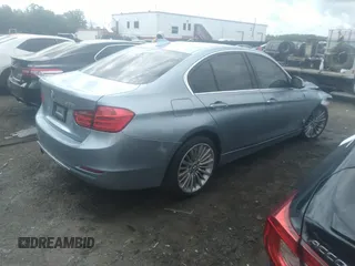 2013 BMW 3 Series 328i with VIN WBA3A5G54DNP25843, listed as a IAAI auction lot 39515836 with 104,045 mi miles. Bid and sale history available at carsss.com. Image 4.