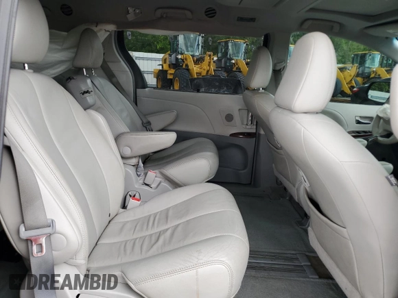 2012 Toyota Sienna XLE AAS with VIN 5TDYK3DC1CS279236, listed as a Copart auction lot 63329165 with 143,937 mi miles and Salvage title. Bid and sale history available at DreamBid. Image 11.