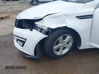 2015 Kia Optima LX with VIN KNAGM4A74F5653459, listed as a IAAI auction lot 42443188 with 109,129 mi miles and . Bid and sale history available at DreamBid. Image 6.