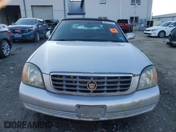 2002 Cadillac DeVille DHS z VIN 1G6KE57Y02U304933, wystawiony jako Copart lot #86919134 z przebiegiem Nie podano mil oraz Czysty tytuł • Clean title. Historia ofert i sprzedaży dostępna na DreamBid. Obrazek 5.