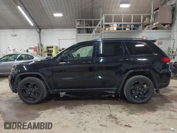 2021 Jeep Grand Cherokee Laredo X with VIN 1C4RJFAG5MC817567, listed as a IAAI auction lot 42297526 with 71,387 mi miles and . Bid and sale history available at DreamBid. Image 14.
