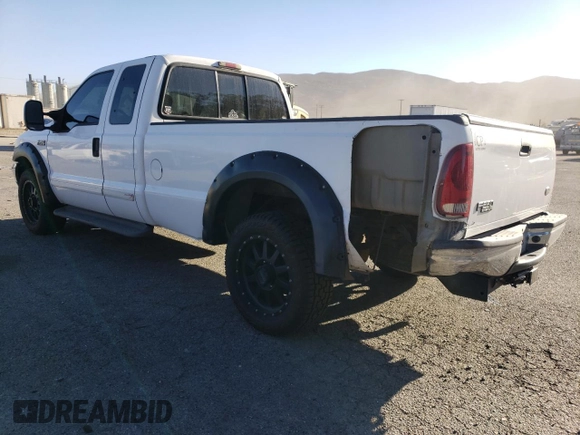 2002 Ford F-250 XL with VIN 1FTNX20L32ED10043, listed as a Copart auction lot 82608574 with 150,324 mi miles and Salvage title. Bid and sale history available at DreamBid. Image 2.