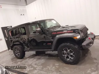 2019 Jeep Wrangler Unlimited Rubicon z VIN 1C4HJXFN7KW561193, wystawiony jako IAAI lot #41500907 z przebiegiem 18 697 mil mil oraz . Historia ofert i sprzedaży dostępna na DreamBid. Obrazek 14.