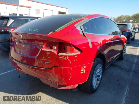 2020 Tesla Model X Long Range with VIN 5YJXCDE22LF217014, listed as a IAAI auction lot 41845824 with 149,375 mi miles and . Bid and sale history available at DreamBid. Image 4.