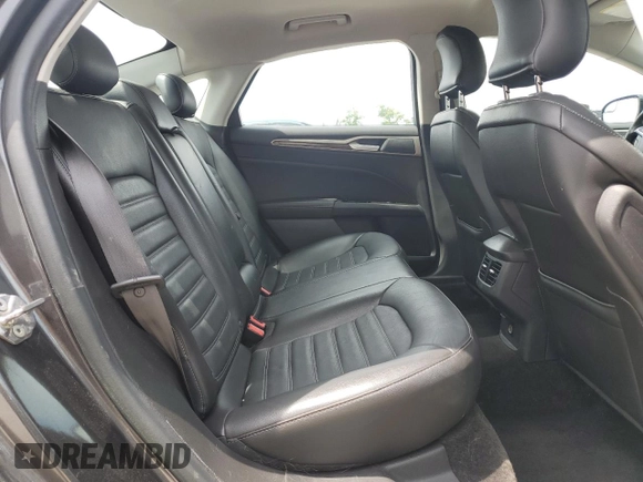 2015 Ford Fusion SE Hybrid with VIN 3FA6P0LUXFR220930, listed as a Copart auction lot 58407235 with 179,682 mi miles and Salvage title. Bid and sale history available at DreamBid. Image 10.