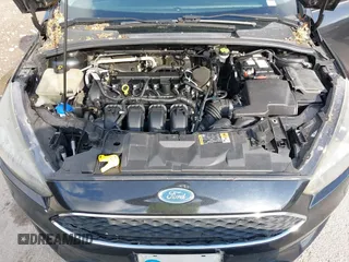 2015 Ford Focus SE with VIN 1FADP3K2XFL319559, listed as a IAAI auction lot 42205107 with 184,499 mi miles. Bid and sale history available at carsss.com. Image 10.
