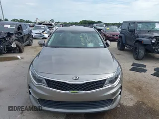 2016 Kia Optima LX with VIN 5XXGT4L37GG019897, listed as a IAAI auction lot 42582213 with 90,318 mi miles and . Bid and sale history available at DreamBid. Image 12.