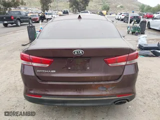 2016 Kia Optima LX with VIN 5XXGT4L30GG075759, listed as a IAAI auction lot 42024856 with 113,740 mi miles. Bid and sale history available at carsss.com. Image 16.