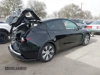 2022 Tesla Model Y Long Range z VIN 7SAYGAEE5NF428327, wystawiony jako IAAI lot #41698750 z przebiegiem 26 846 mil mil oraz . Historia ofert i sprzedaży dostępna na DreamBid. Obrazek 4.
