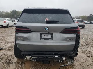 2024 BMW X5 sDrive40i z VIN 5UX13EU09R9S65574, wystawiony jako Copart lot #50068745 z przebiegiem 27 083 mil mil oraz Szkoda całkowita • Salvage title. Historia ofert i sprzedaży dostępna na DreamBid. Obrazek 6.