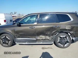 2023 Kia Telluride S with VIN 5XYP6DGC2PG387093, listed as a IAAI auction lot 42299026 with 12,895 mi miles and . Bid and sale history available at DreamBid. Image 14.