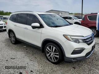 2016 Honda Pilot Touring with VIN 5FNYF6H92GB057531, listed as a Copart auction lot 54354145 with 86,806 mi miles and Salvage Title. Bid and sale history available at DreamBid. Image 4.