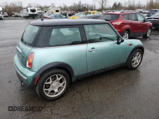 2002 MINI Hardtop with VIN WMWRC33482TC36332, listed as a Copart auction lot 42811115 with 203,708 mi miles and Salvage Title. Bid and sale history available at DreamBid. Image 3.