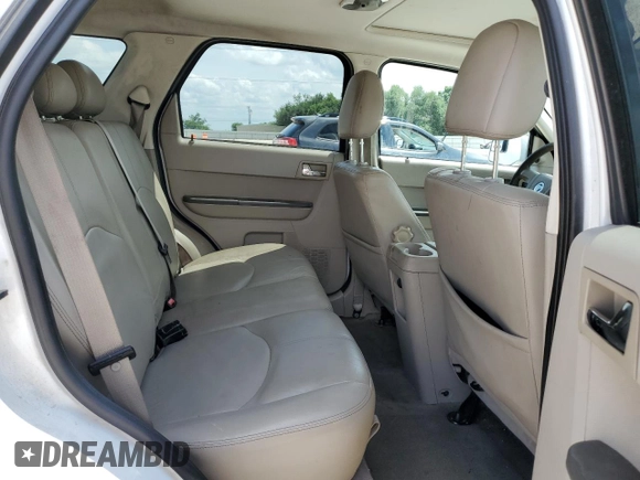 2008 Mercury Mariner Premier z VIN 4M2CU87128KJ53679, wystawiony jako Copart lot #54269815 z przebiegiem Nie podano mil oraz Szkoda całkowita • Salvage title. Historia ofert i sprzedaży dostępna na DreamBid. Obrazek 11.