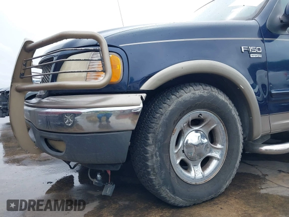 2003 Ford F-150 XLT with VIN 1FTRW07L33KC83234, listed as a IAAI auction lot 41894573 with 215,232 mi miles. Bid and sale history available at carsss.com. Image 17.